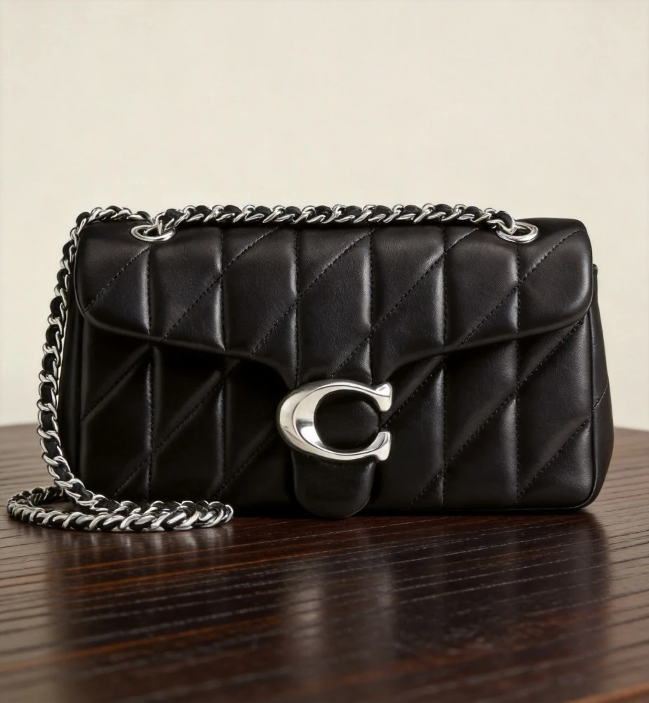 Zwarte Nora Gewatteerde Crossbody met zilverkleurige hardware